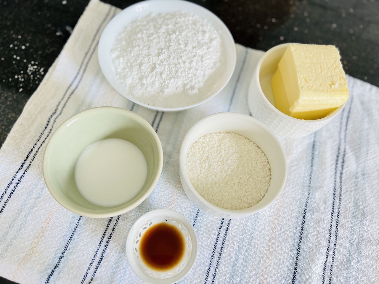 Coconut Loaf Cake with Coconut Buttercream Frosting ThousandLemons